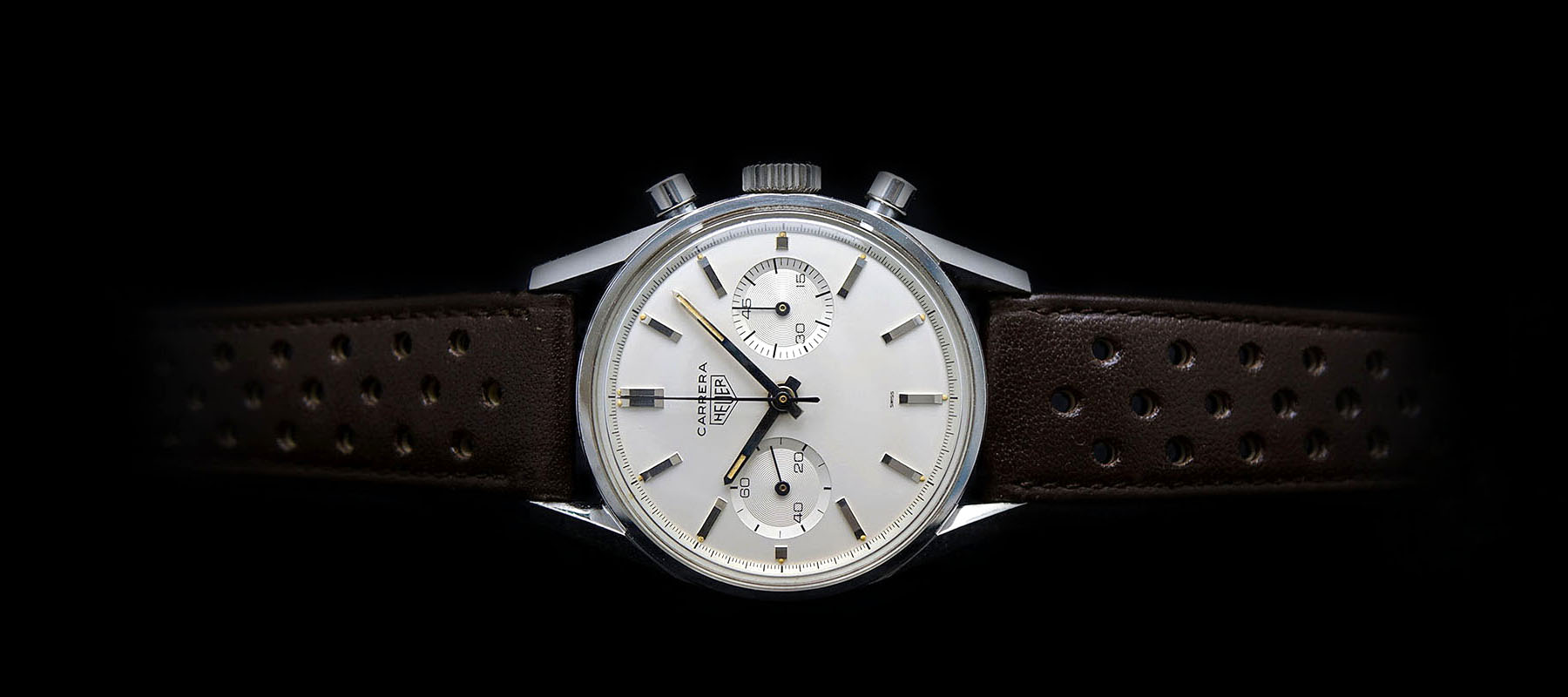 White-dial vintage Heuer Carrera with a brown leather strap